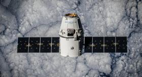 Nasa's dragon spacecraft in space.