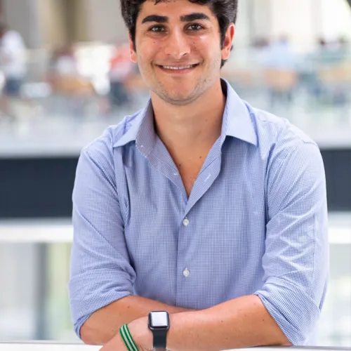 A man wearing a blue shirt.
